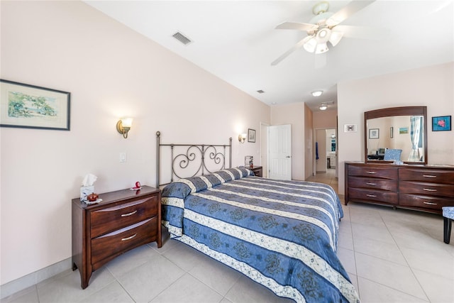 bedroom featuring light tile patterned flooring and a ceiling fan