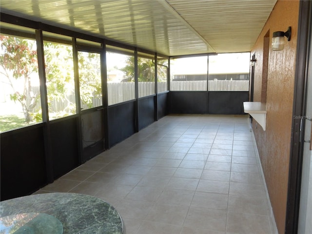 582 Reading St NW, Port Charlotte, FL 33952 - unfurnished sunroom featuring healthy amount of natural light
