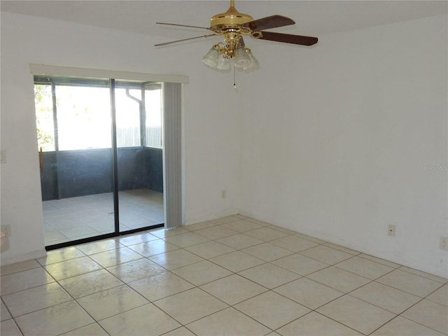 582 Reading St NW, Port Charlotte, FL 33952 - unfurnished room featuring ceiling fan and light tile patterned floors