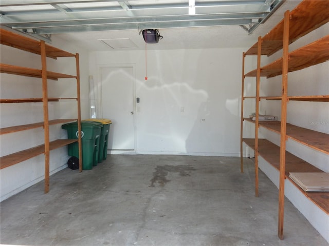 582 Reading St NW, Port Charlotte, FL 33952 - garage featuring a garage door opener
