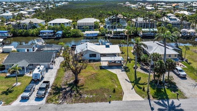 2560 Baybreeze St, Saint James City, FL 33956 - drone / aerial view with a water view and a residential view