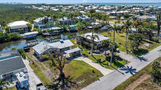 2560 Baybreeze St, Saint James City, FL 33956 - aerial view featuring a water view and a residential view