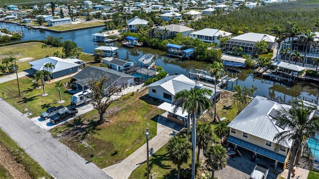2560 Baybreeze St, Saint James City, FL 33956 - bird's eye view with a water view and a residential view