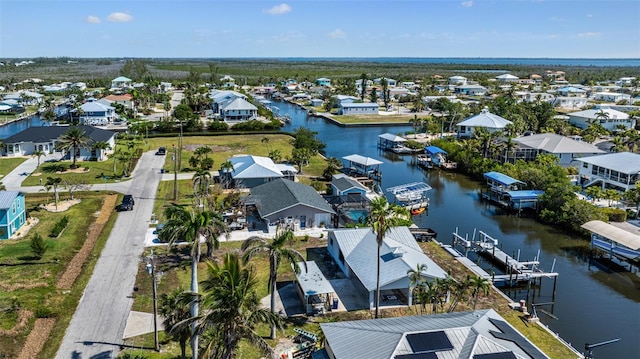 2560 Baybreeze St, Saint James City, FL 33956 - birds eye view of property with a water view and a residential view