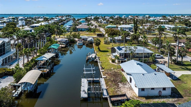 2560 Baybreeze St, Saint James City, FL 33956 - aerial view featuring a residential view and a water view