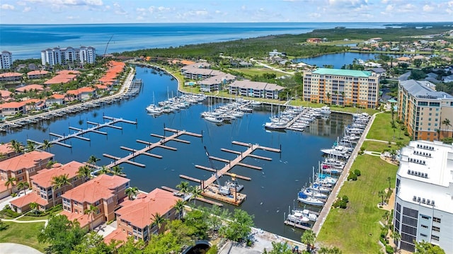birds eye view of property featuring a water view