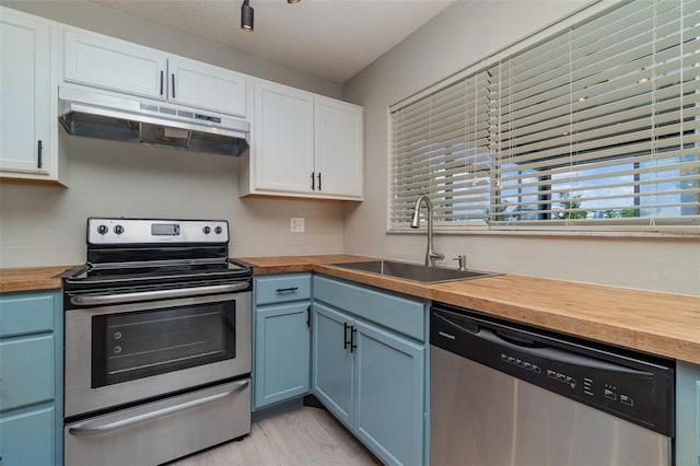 8238 San Jacinto Ave, North Port, FL 34287 - kitchen featuring wood counters and stainless steel appliances