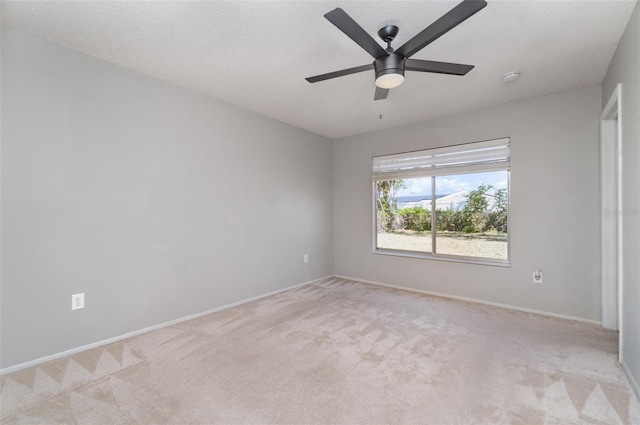 8238 San Jacinto Ave, North Port, FL 34287 - empty room with light colored carpet, baseboards, and a ceiling fan