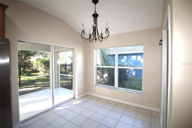 4749 Oakley Rd, North Port, FL 34288 - unfurnished dining area with a wealth of natural light, tile patterned floors, an inviting chandelier, and lofted ceiling
