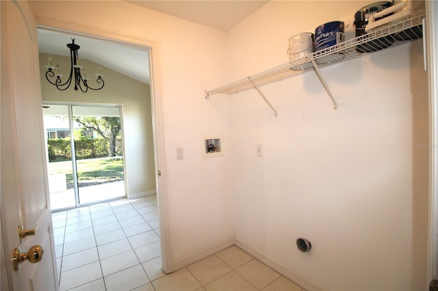 4749 Oakley Rd, North Port, FL 34288 - laundry area with laundry area, light tile patterned floors, hookup for a washing machine, electric dryer hookup, and a chandelier