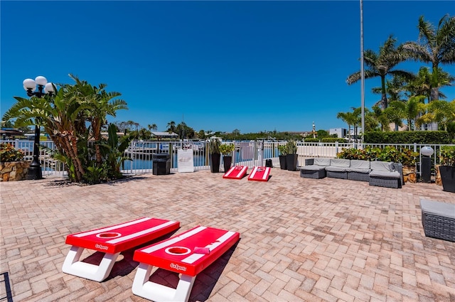 7150 N Tamiami Trl Unit S-600, Sarasota, FL 34243 - view of patio / terrace featuring an outdoor living space