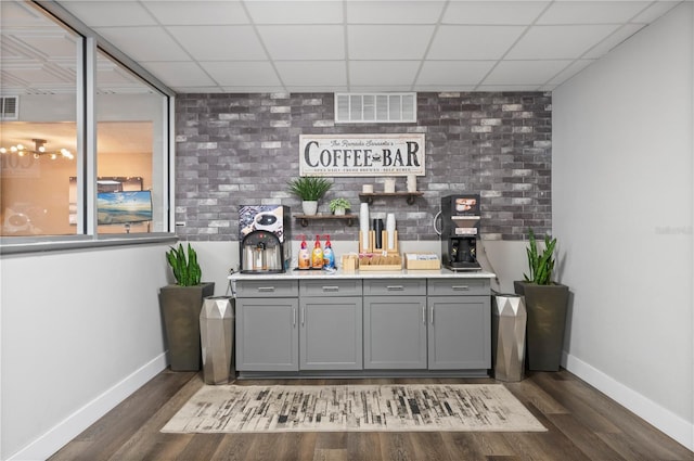 7150 N Tamiami Trl Unit S-600, Sarasota, FL 34243 - bar with baseboards, wood finished floors, and visible vents