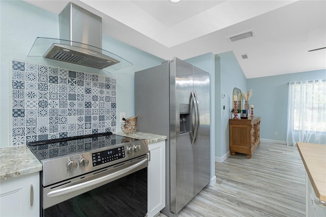 kitchen featuring stainless steel appliances, island range hood, visible vents, and white cabinets