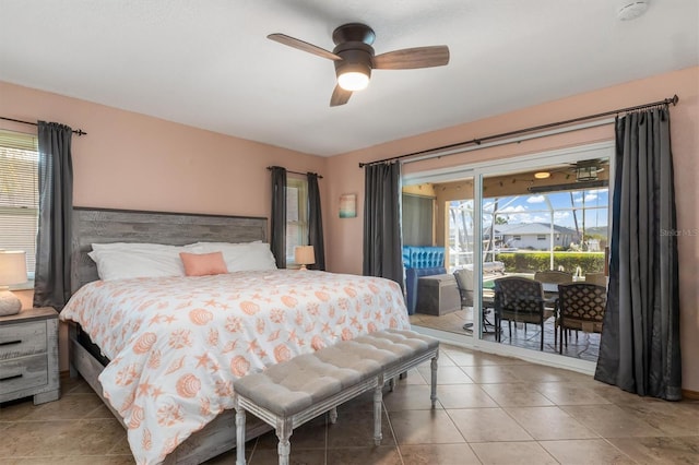 tiled bedroom with ceiling fan and access to exterior