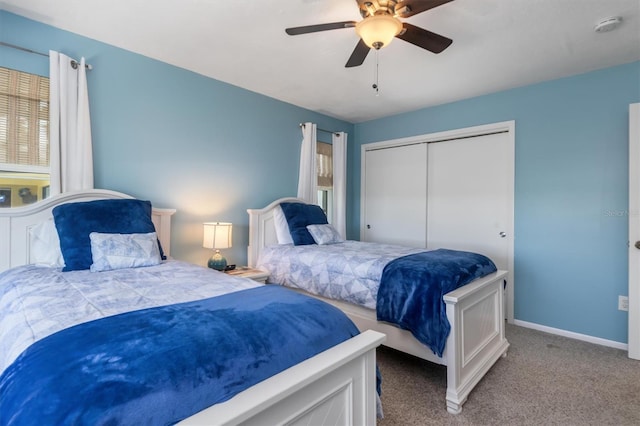 bedroom featuring carpet floors, a closet, a ceiling fan, and baseboards