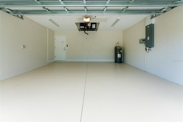 4336 Blackman St, North Port, FL 34291 - garage with a garage door opener, electric water heater, and electric panel