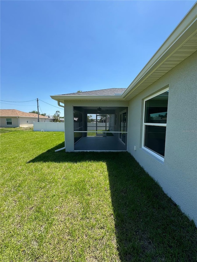 4336 Blackman St, North Port, FL 34291 - view of yard with a sunroom and fence