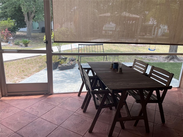 10740 Pearl Bay Cir, Estero, FL 33928 - sunroom / solarium featuring a healthy amount of sunlight and outdoor dining area