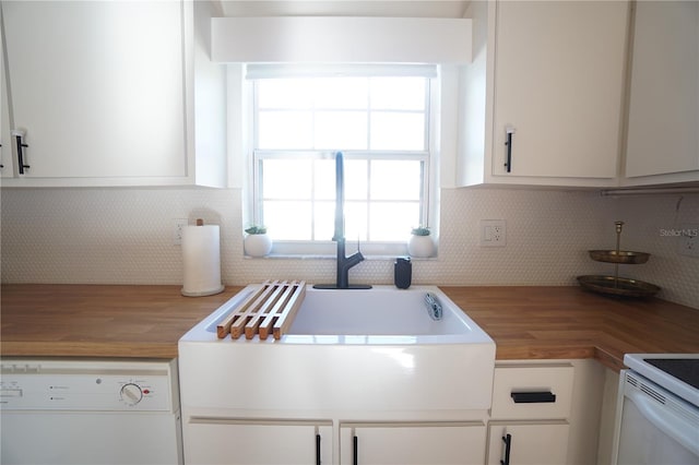 10740 Pearl Bay Cir, Estero, FL 33928 - kitchen featuring wooden counters, white cabinets, and white appliances