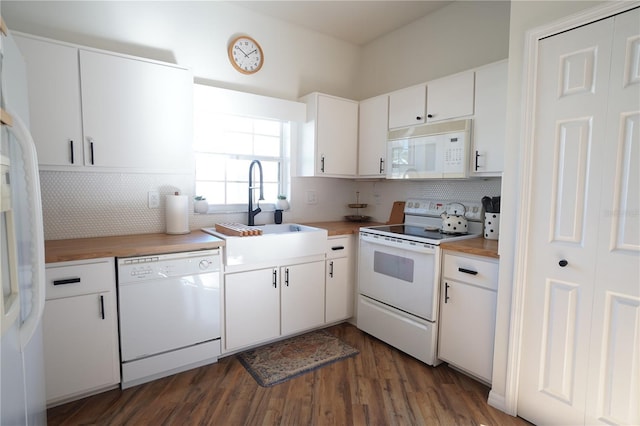 10740 Pearl Bay Cir, Estero, FL 33928 - kitchen featuring dark wood-style floors, a sink, backsplash, and white appliances