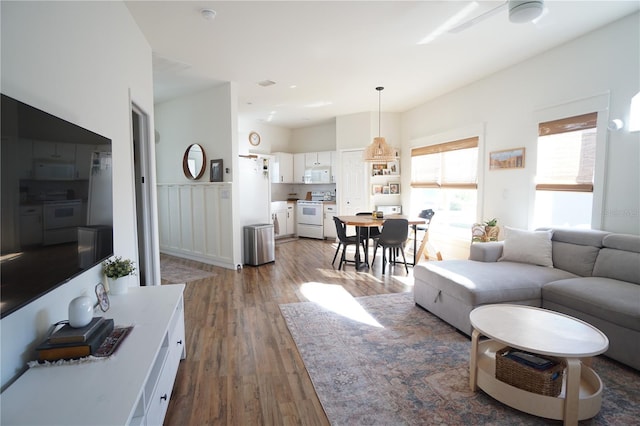 10740 Pearl Bay Cir, Estero, FL 33928 - living room featuring wood finished floors and ceiling fan
