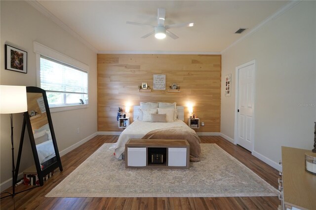 10740 Pearl Bay Cir, Estero, FL 33928 - bedroom featuring ornamental molding, visible vents, wood finished floors, and baseboards