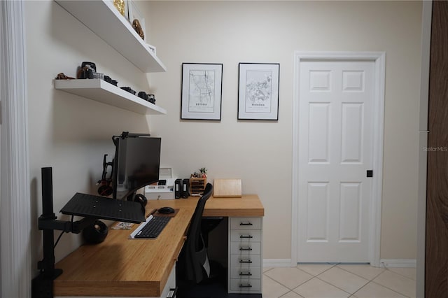 10740 Pearl Bay Cir, Estero, FL 33928 - office area featuring baseboards and light tile patterned flooring