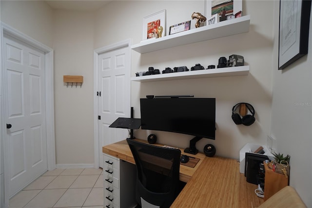 10740 Pearl Bay Cir, Estero, FL 33928 - office space featuring baseboards and light tile patterned flooring