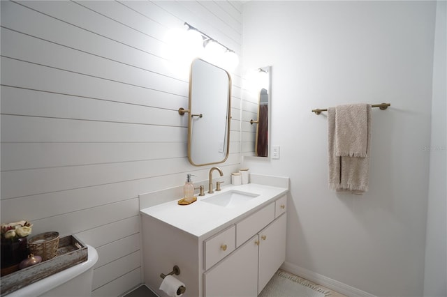 10740 Pearl Bay Cir, Estero, FL 33928 - bathroom featuring baseboards, toilet, and vanity