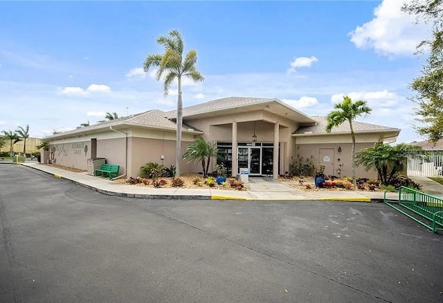 10740 Pearl Bay Cir, Estero, FL 33928 - exterior space with stucco siding