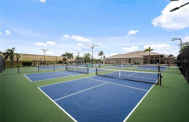 10740 Pearl Bay Cir, Estero, FL 33928 - view of tennis court featuring fence