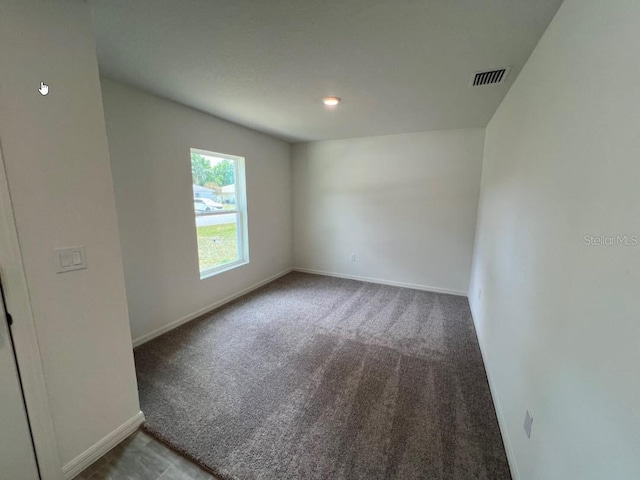 25 Ryding Ln, Palm Coast, FL 32164 - unfurnished room featuring baseboards, carpet flooring, visible vents, and recessed lighting