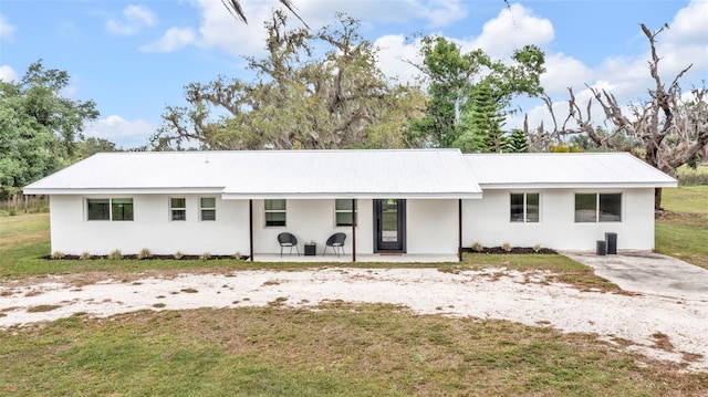 1635 SW Rodgers Ave, Arcadia, FL 34266 - single story home with a patio area, stucco siding, and a front yard