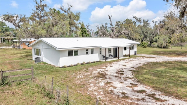 1635 SW Rodgers Ave, Arcadia, FL 34266 - ranch-style home featuring central AC, a front lawn, driveway, and stucco siding