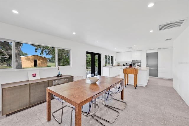 1635 SW Rodgers Ave, Arcadia, FL 34266 - dining area with recessed lighting, light tile patterned floors, visible vents, and french doors