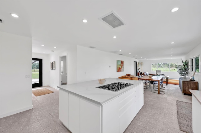 1635 SW Rodgers Ave, Arcadia, FL 34266 - kitchen featuring visible vents, white cabinets, recessed lighting, and modern cabinets