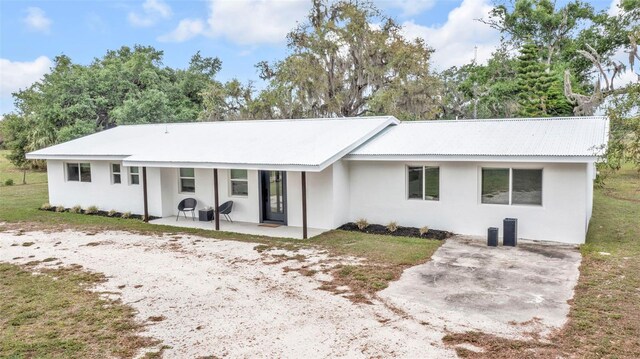1635 SW Rodgers Ave, Arcadia, FL 34266 - view of front of home featuring a patio and stucco siding