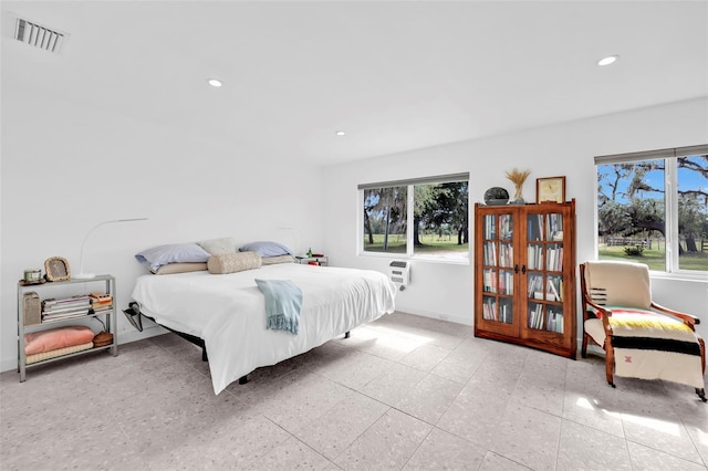 1635 SW Rodgers Ave, Arcadia, FL 34266 - bedroom with baseboards, multiple windows, visible vents, and recessed lighting