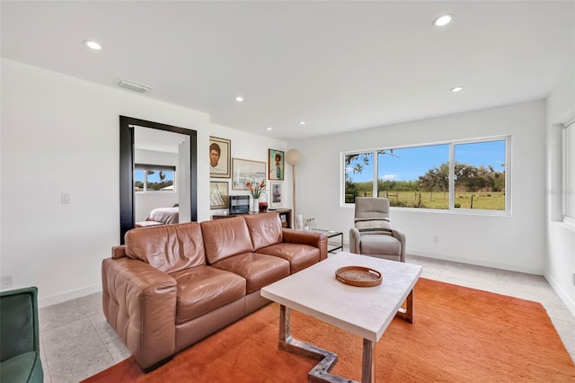1635 SW Rodgers Ave, Arcadia, FL 34266 - living area with recessed lighting, light tile patterned floors, and visible vents