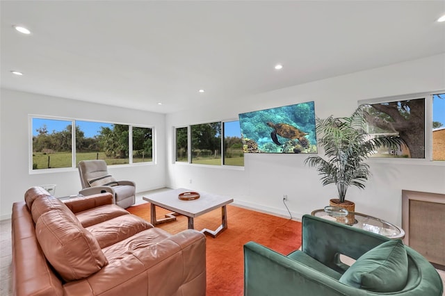 1635 SW Rodgers Ave, Arcadia, FL 34266 - living room featuring carpet floors, baseboards, and recessed lighting