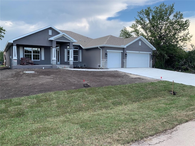112 Cougar Way, Rotonda West, FL 33947 - ranch-style home with an attached garage, stucco siding, concrete driveway, and a front lawn