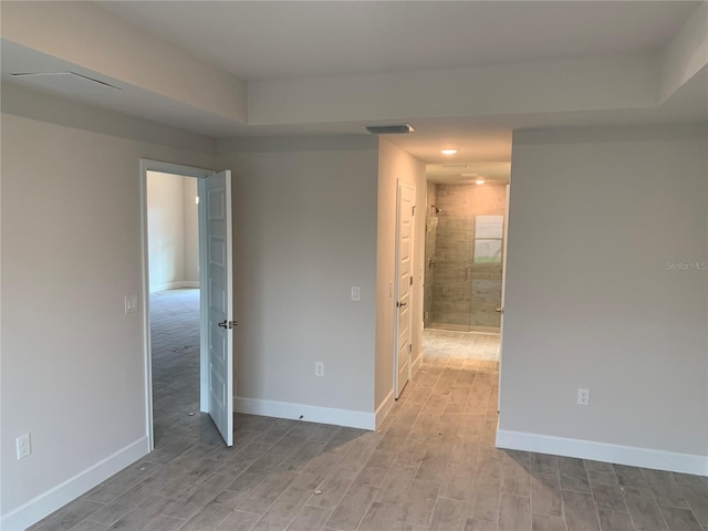 112 Cougar Way, Rotonda West, FL 33947 - spare room featuring wood finished floors