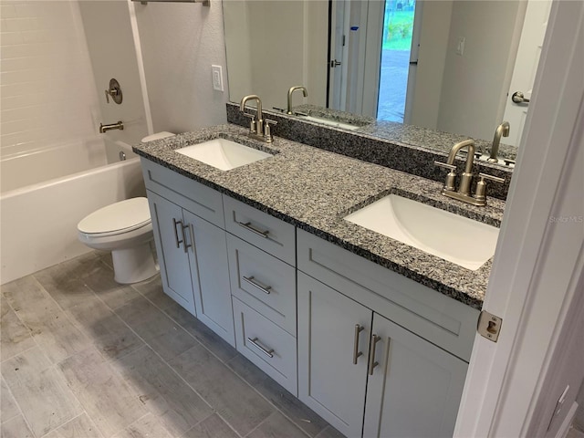 112 Cougar Way, Rotonda West, FL 33947 - bathroom featuring double vanity and shower / tub combination