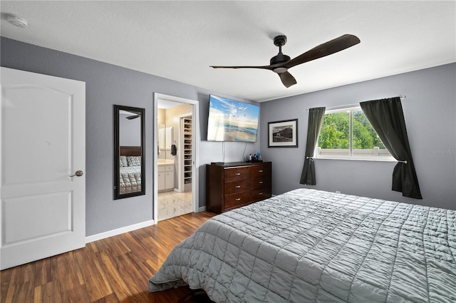 1773 Portage St, North Port, FL 34287 - bedroom with baseboards, ceiling fan, and wood finished floors