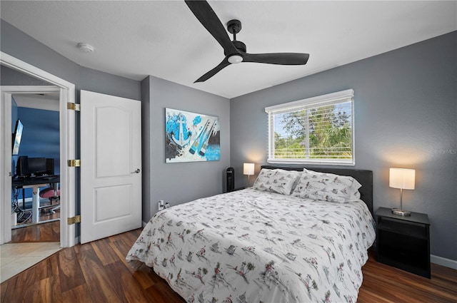 1773 Portage St, North Port, FL 34287 - bedroom featuring a ceiling fan and wood finished floors