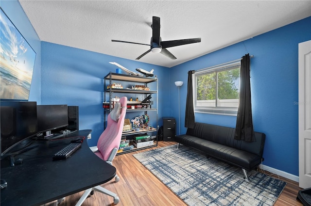 1773 Portage St, North Port, FL 34287 - office space with a ceiling fan, a textured ceiling, and wood finished floors