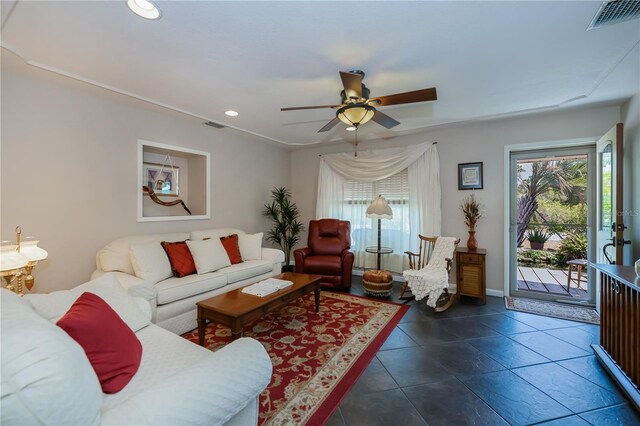 tiled living area featuring recessed lighting, visible vents, a ceiling fan, and baseboards