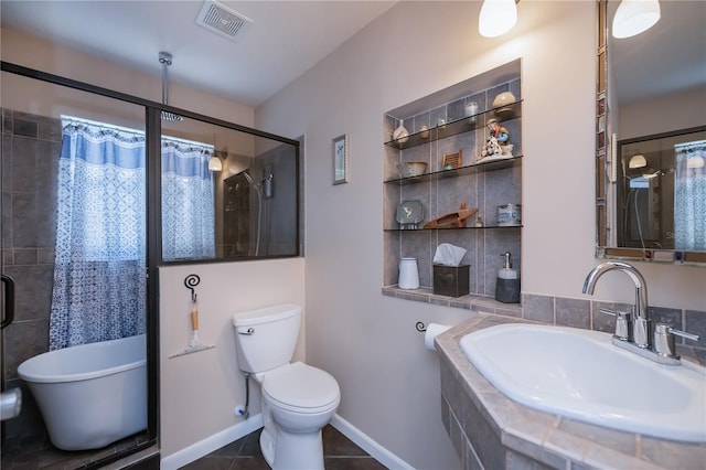 bathroom featuring a shower with shower curtain, a tub, and a sink