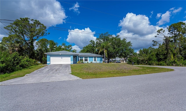 3175 Lakatos St, North Port, FL 34286 - ranch-style home featuring a front lawn, driveway, and a garage