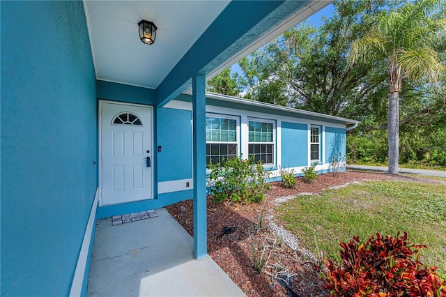 3175 Lakatos St, North Port, FL 34286 - view of exterior entry featuring stucco siding